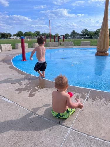 20220609-boys-at-splash-pad-Sugar-Bottom-IA