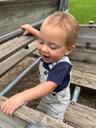20220525-Isaiah-in-the-old-truck-Kalona-Park